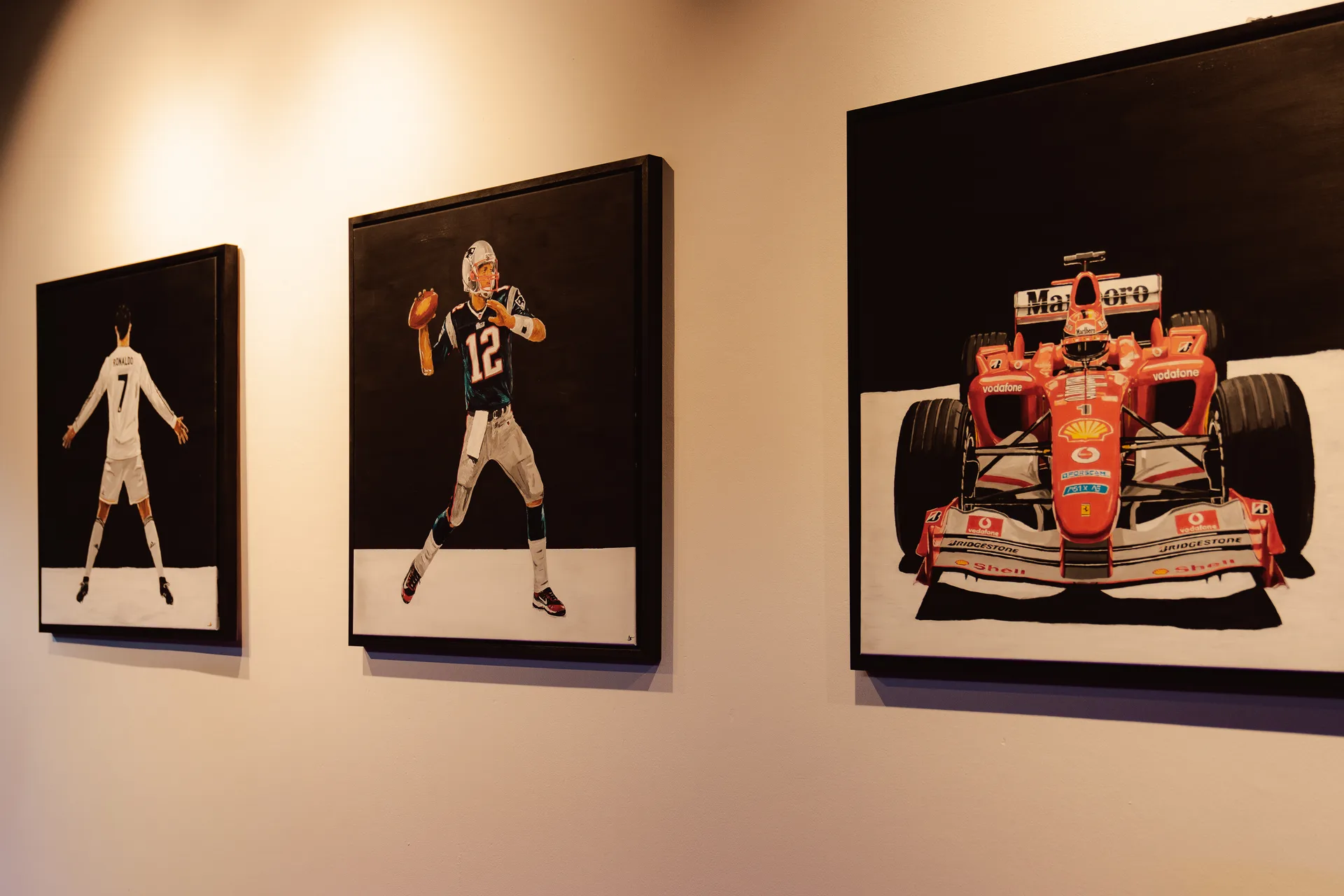 Paintings hung on the wall of AS Artstudio at its opening