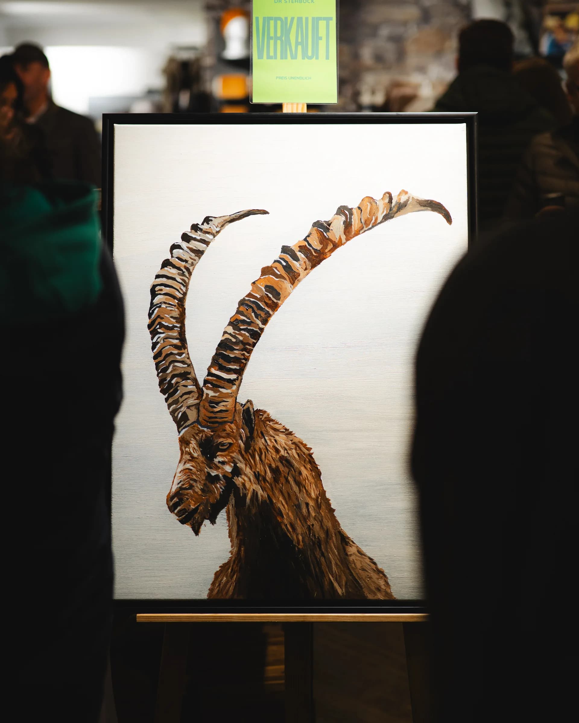 Sold ibex painting on an easel at Kunstnacht Schruns 2025