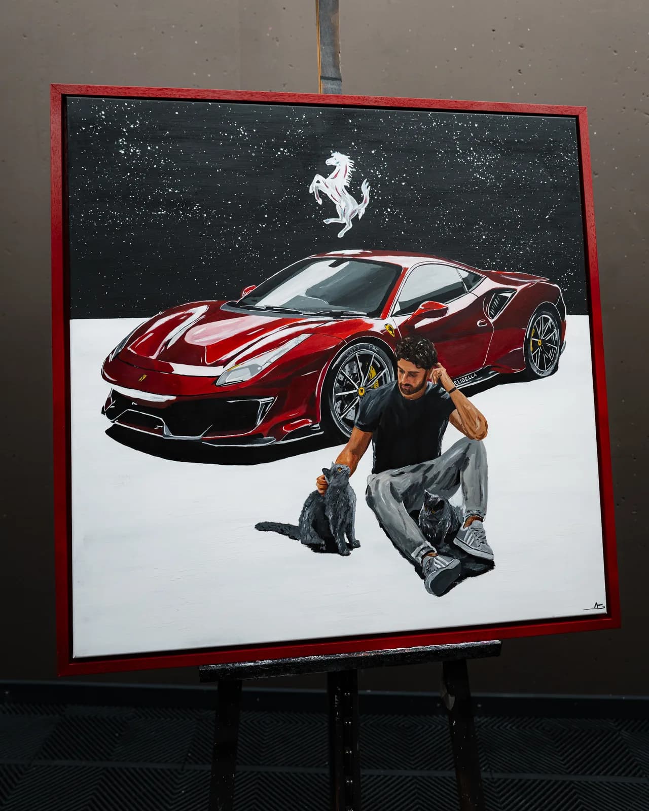 The finished painting “The Eligella”: a red Ferrari 488 Pista with a seated man and a black cat