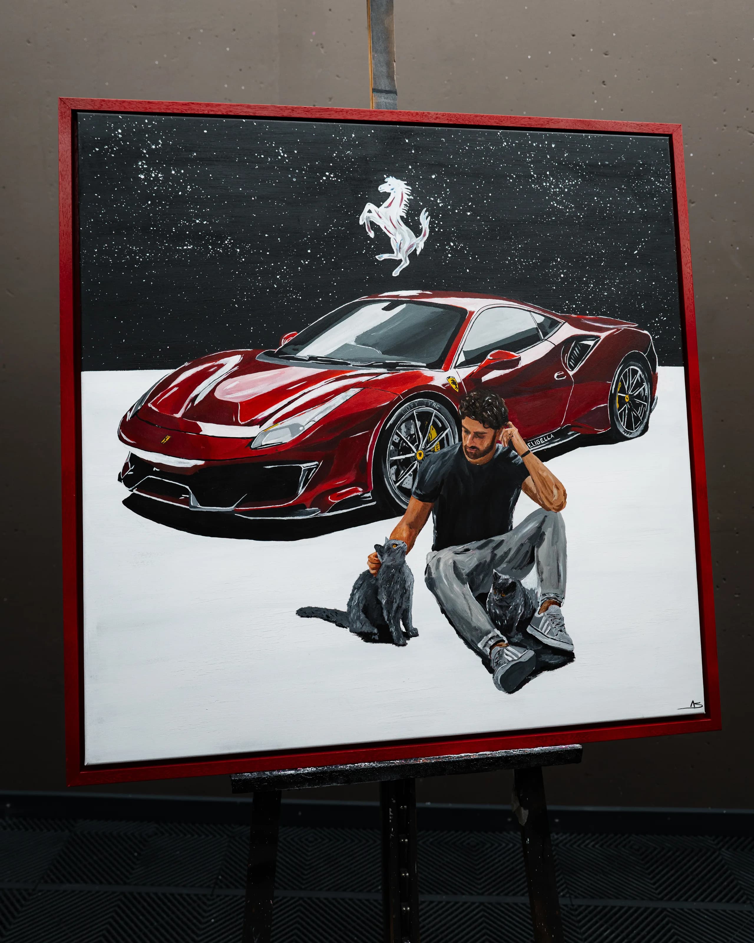 The finished painting “The Eligella”: a red Ferrari 488 Pista with a seated man and a black cat